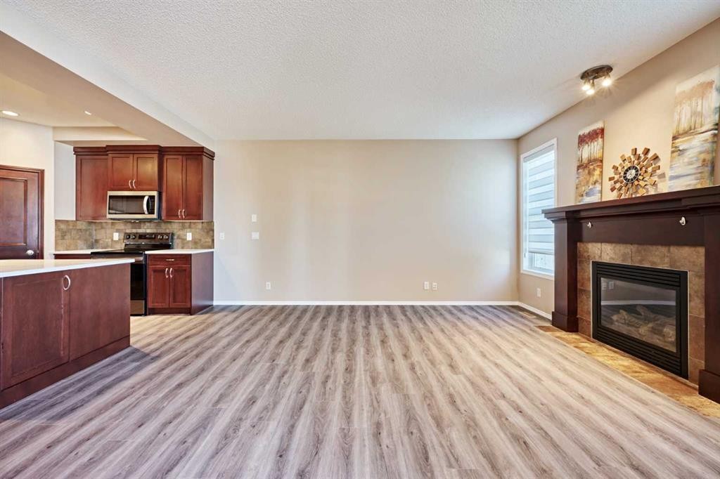 789 Panatella Boulevard Nw, Calgary, AB - Indoor With Fireplace