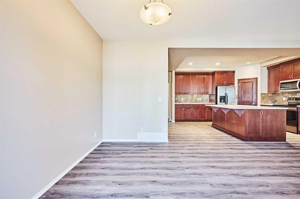 789 Panatella Boulevard Nw, Calgary, AB - Indoor Photo Showing Kitchen