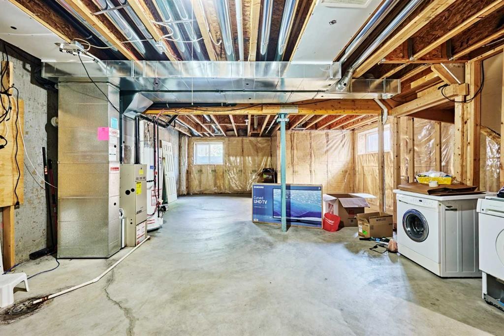 789 Panatella Boulevard Nw, Calgary, AB - Indoor Photo Showing Laundry Room