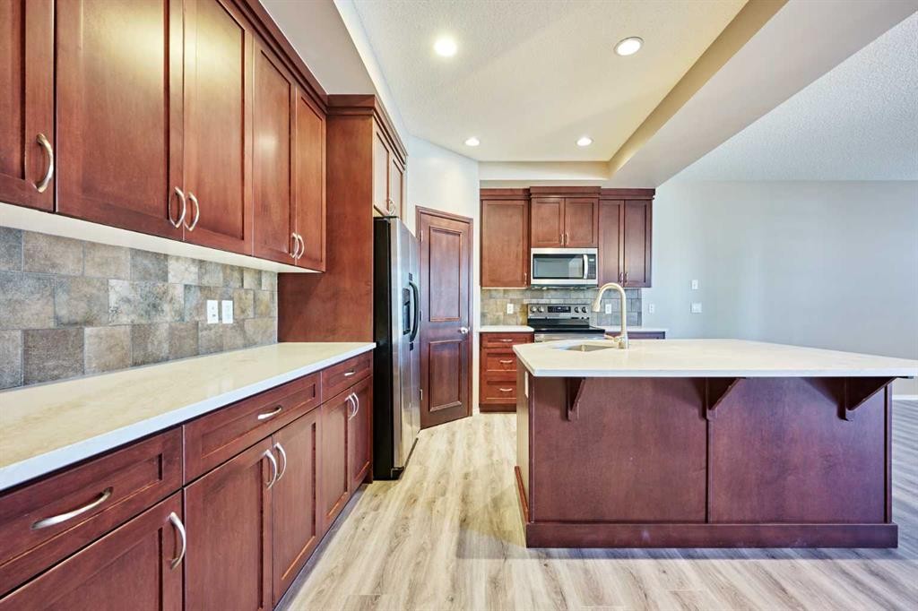 789 Panatella Boulevard Nw, Calgary, AB - Indoor Photo Showing Kitchen