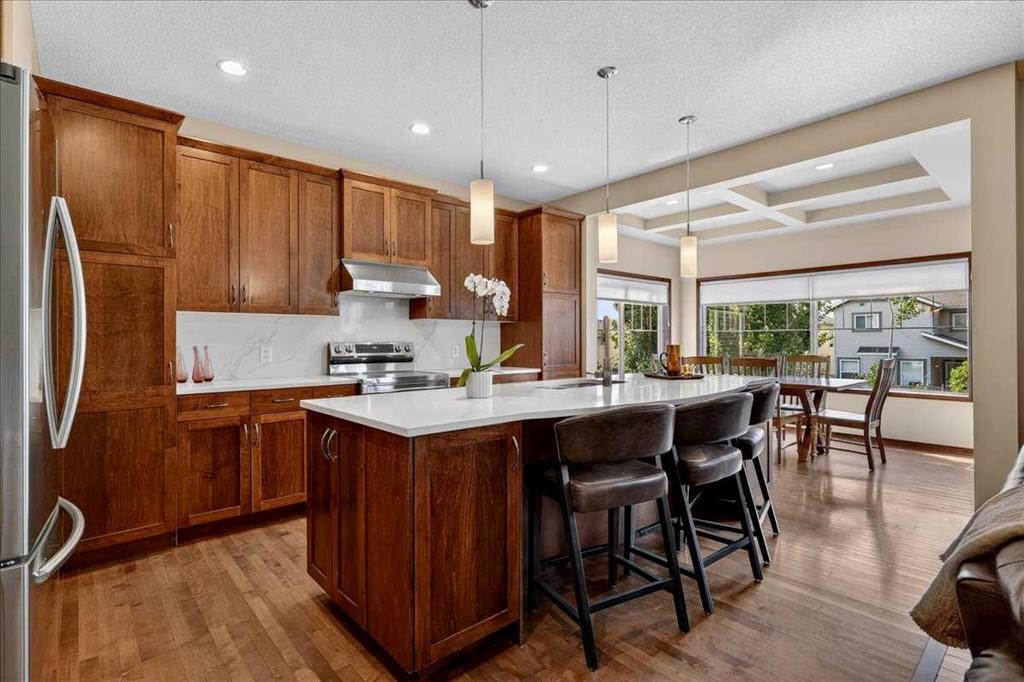 277 Evermeadow Avenue Sw, Calgary, AB - Indoor Photo Showing Kitchen With Stainless Steel Kitchen With Upgraded Kitchen