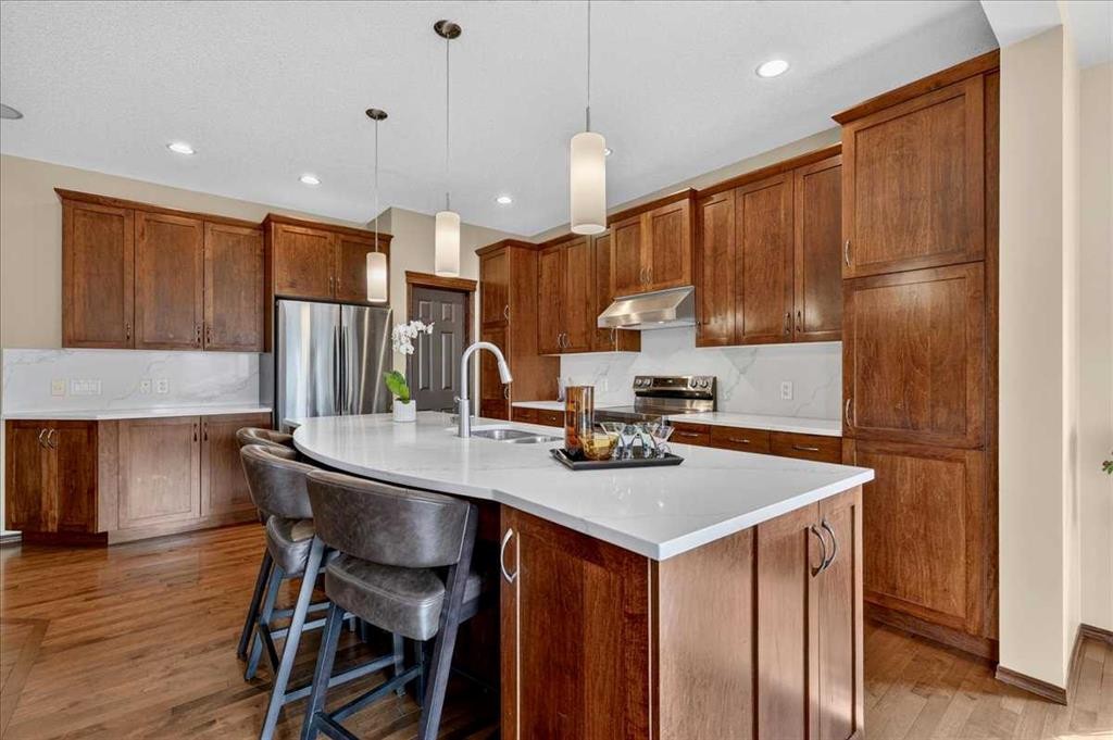 277 Evermeadow Avenue Sw, Calgary, AB - Indoor Photo Showing Kitchen With Stainless Steel Kitchen
