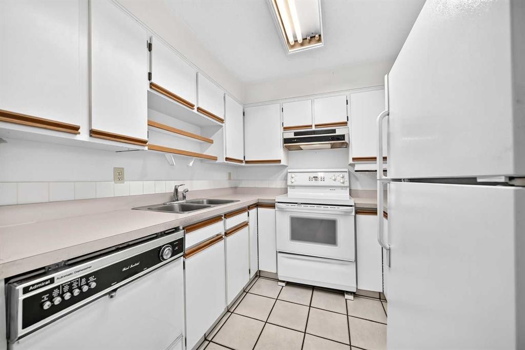 6437 Coach Hill Road Sw, Calgary, AB - Indoor Photo Showing Other Room With Fireplace