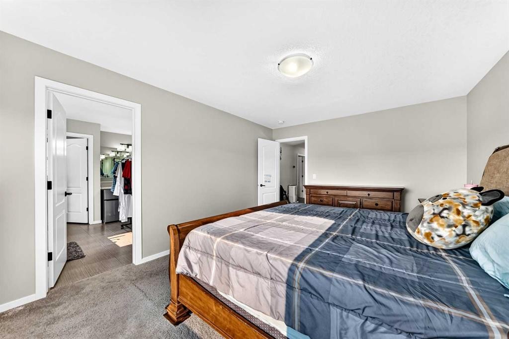 296 Nolancrest Heights Nw, Calgary, AB - Indoor Photo Showing Bedroom