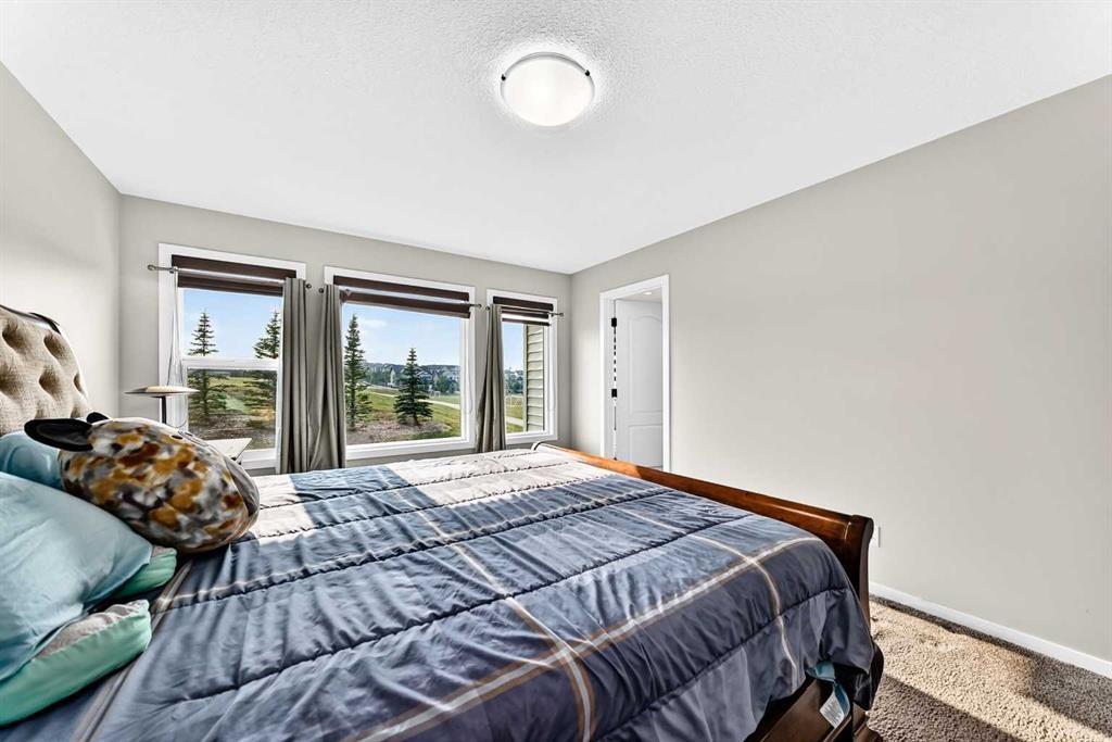 296 Nolancrest Heights Nw, Calgary, AB - Indoor Photo Showing Bedroom