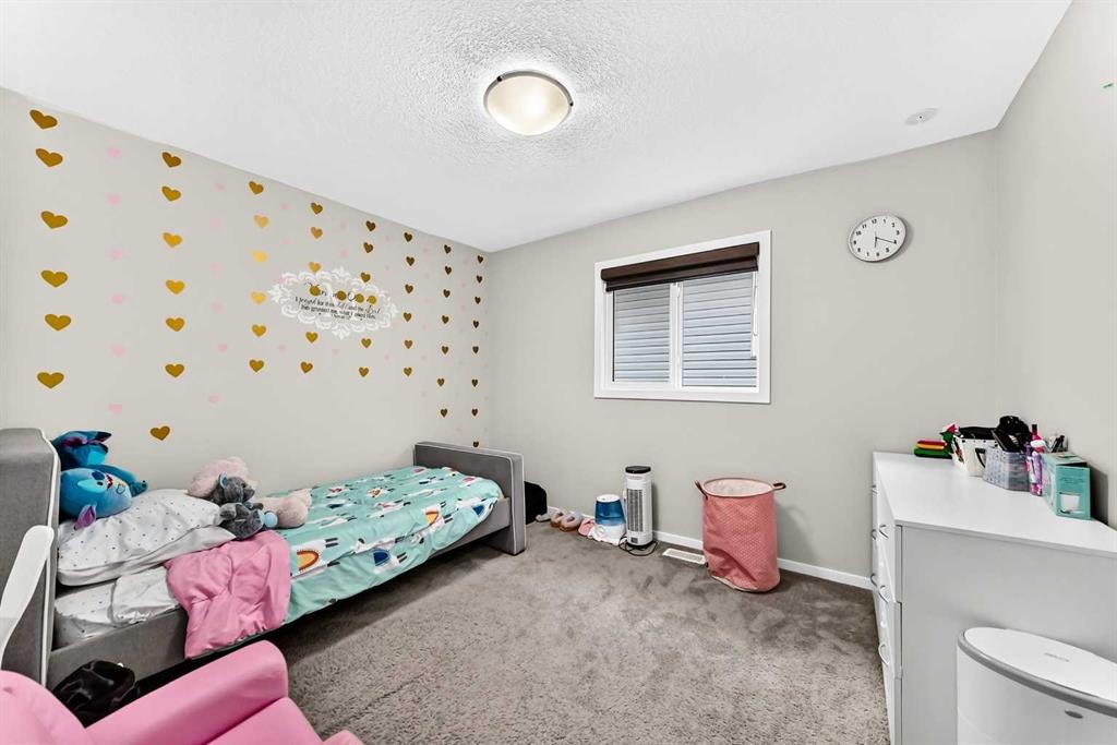 296 Nolancrest Heights Nw, Calgary, AB - Indoor Photo Showing Bedroom