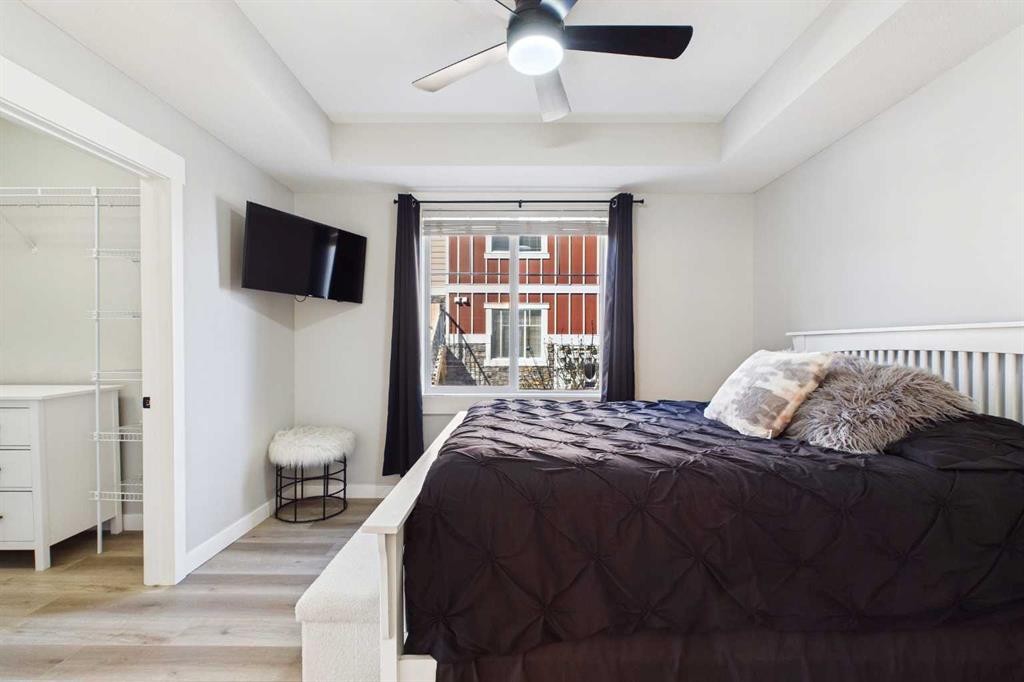 1-67 West Coach Manor Sw, Calgary, AB - Indoor Photo Showing Bedroom
