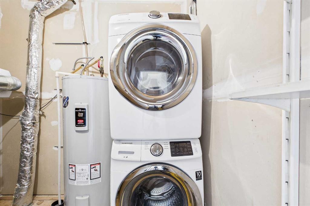 1-67 West Coach Manor Sw, Calgary, AB - Indoor Photo Showing Laundry Room