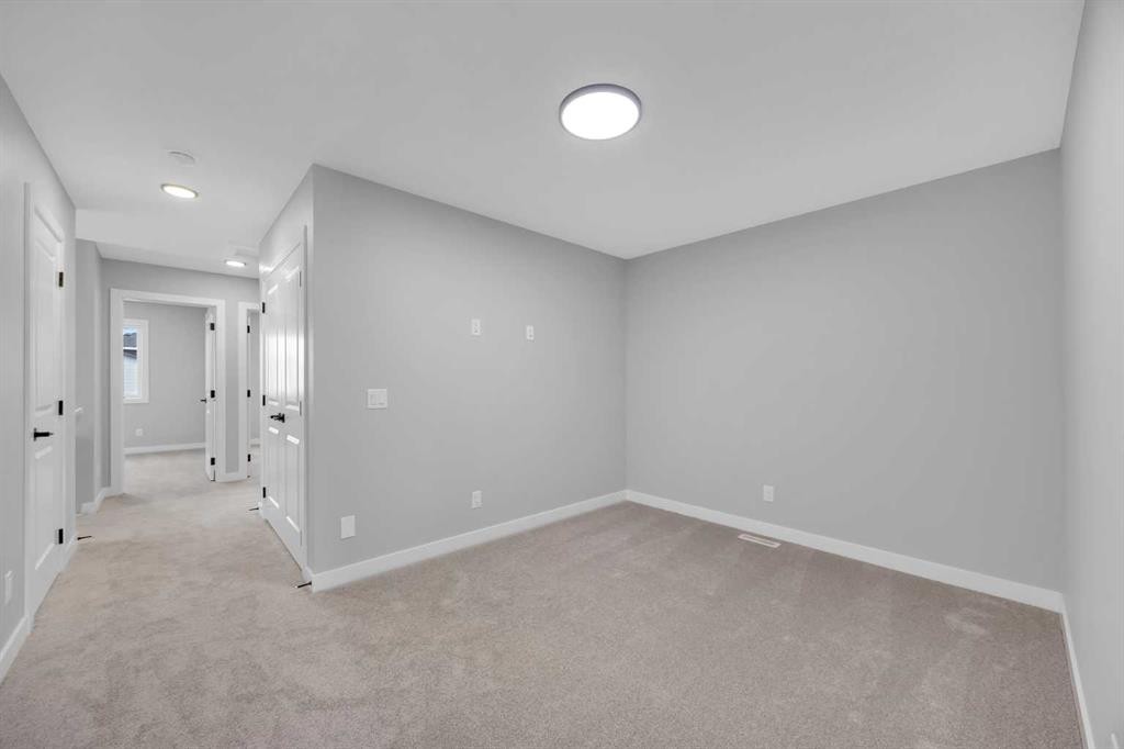 10 Versant Path Sw, Calgary, AB - Indoor Photo Showing Other Room