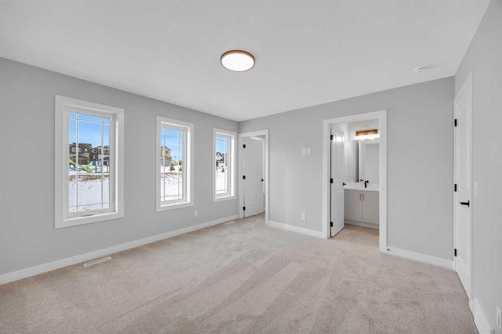 10 Versant Path Sw, Calgary, AB - Indoor Photo Showing Other Room