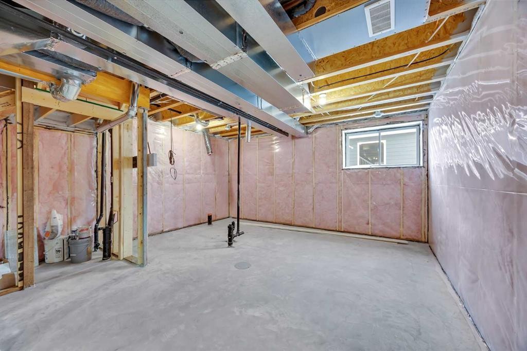 10 Versant Path Sw, Calgary, AB - Indoor Photo Showing Basement