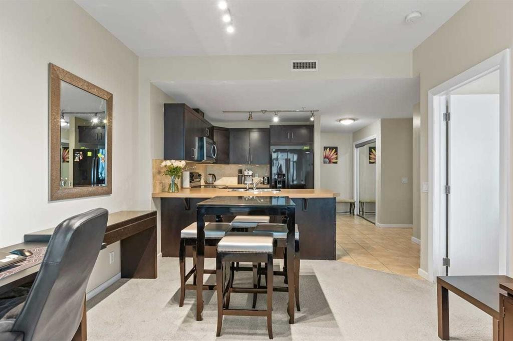 502-1410 1 Street Se, Calgary, AB - Indoor Photo Showing Dining Room
