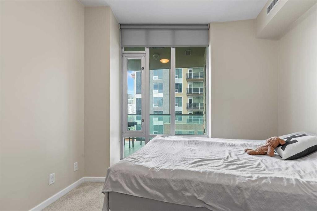 502-1410 1 Street Se, Calgary, AB - Indoor Photo Showing Bedroom
