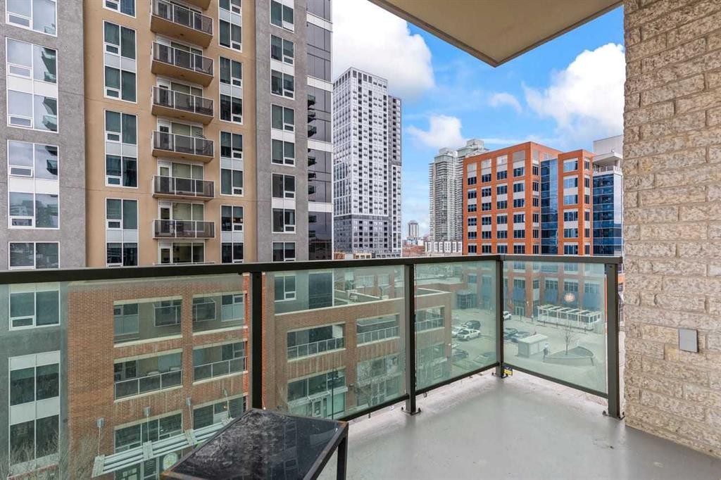 502-1410 1 Street Se, Calgary, AB - Outdoor With Balcony With Facade