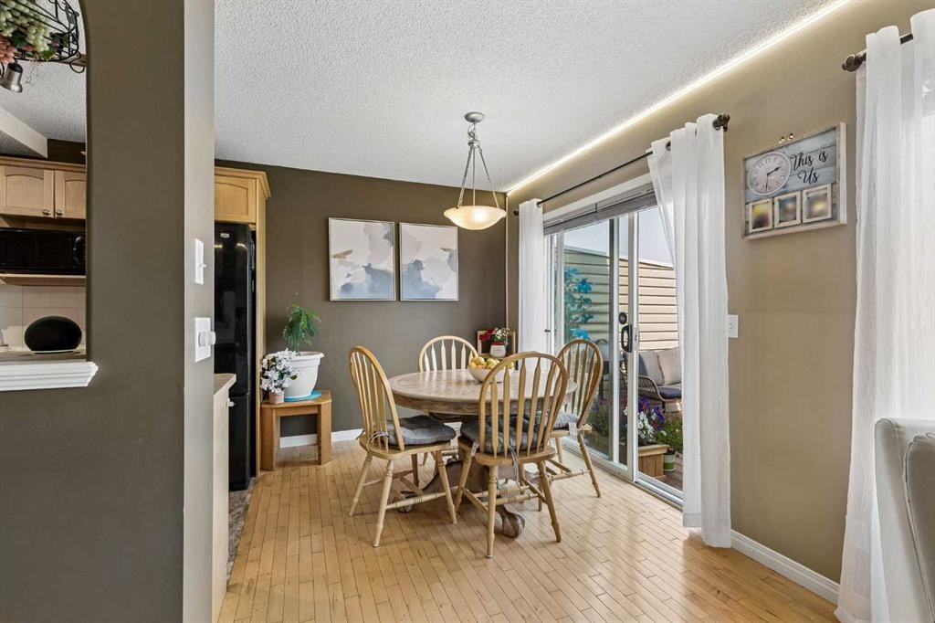 10-117 Bow Ridge Drive, Cochrane, AB - Indoor Photo Showing Dining Room