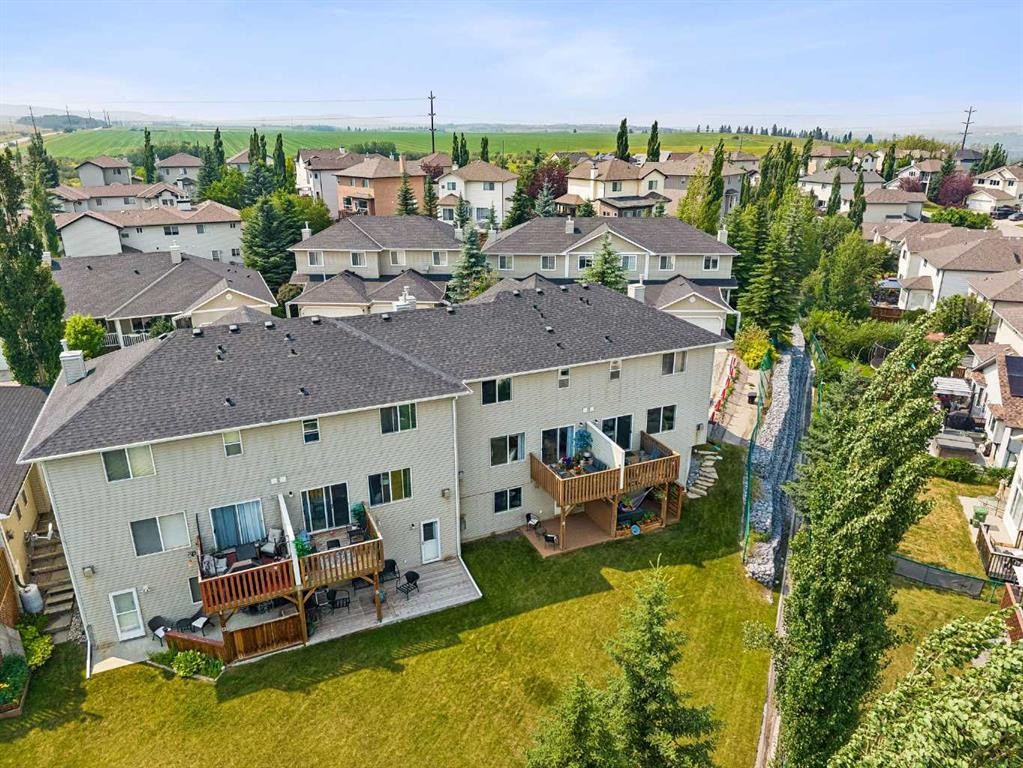10-117 Bow Ridge Drive, Cochrane, AB - Outdoor With Deck Patio Veranda