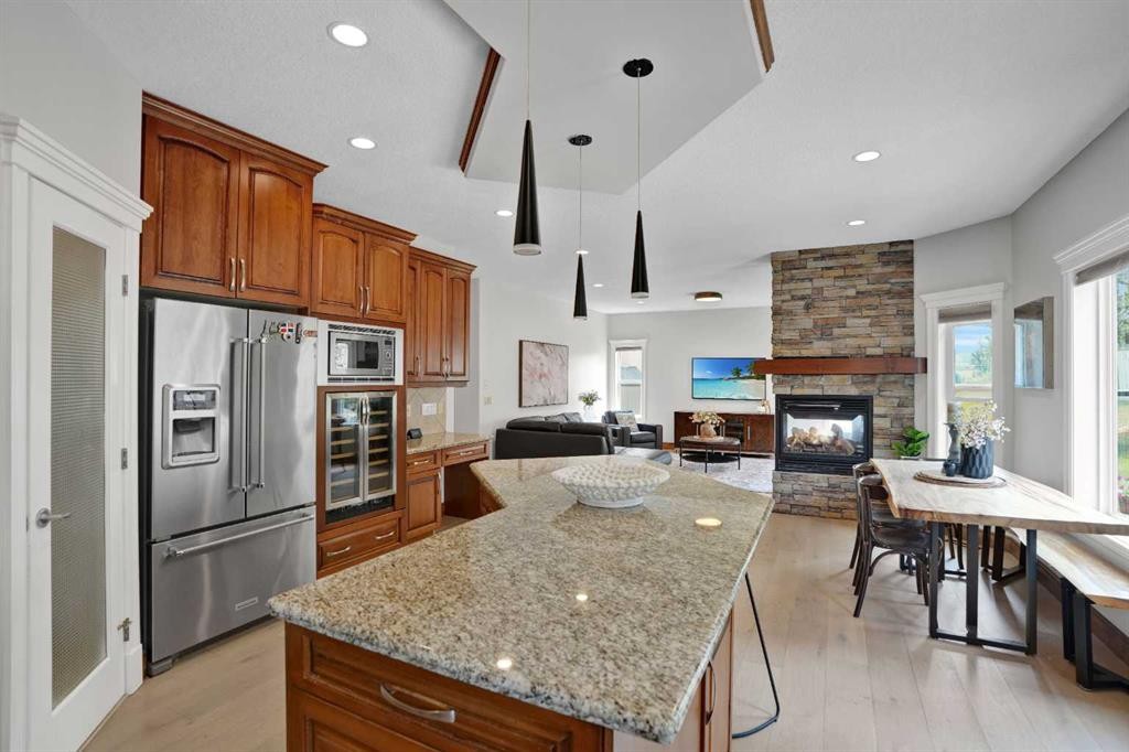 45 Sherwood View Nw, Calgary, AB - Indoor Photo Showing Kitchen With Fireplace With Upgraded Kitchen