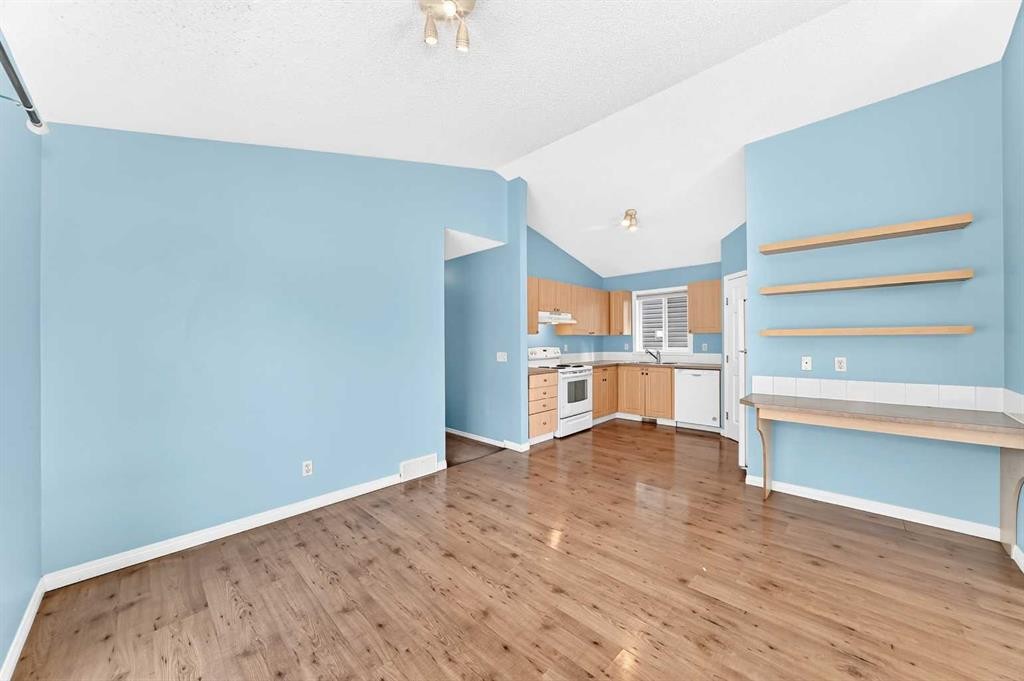 76 Coville Close Ne, Calgary, AB - Indoor Photo Showing Other Room
