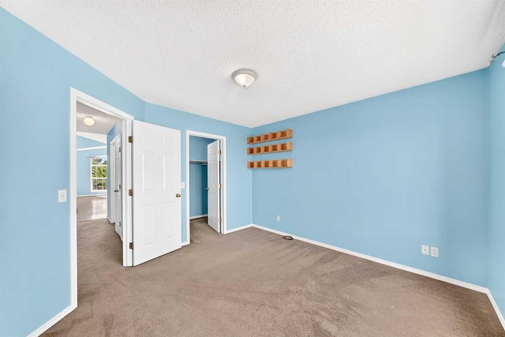 76 Coville Close Ne, Calgary, AB - Indoor Photo Showing Other Room