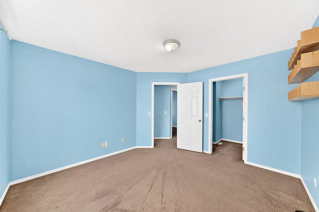 76 Coville Close Ne, Calgary, AB - Indoor Photo Showing Other Room