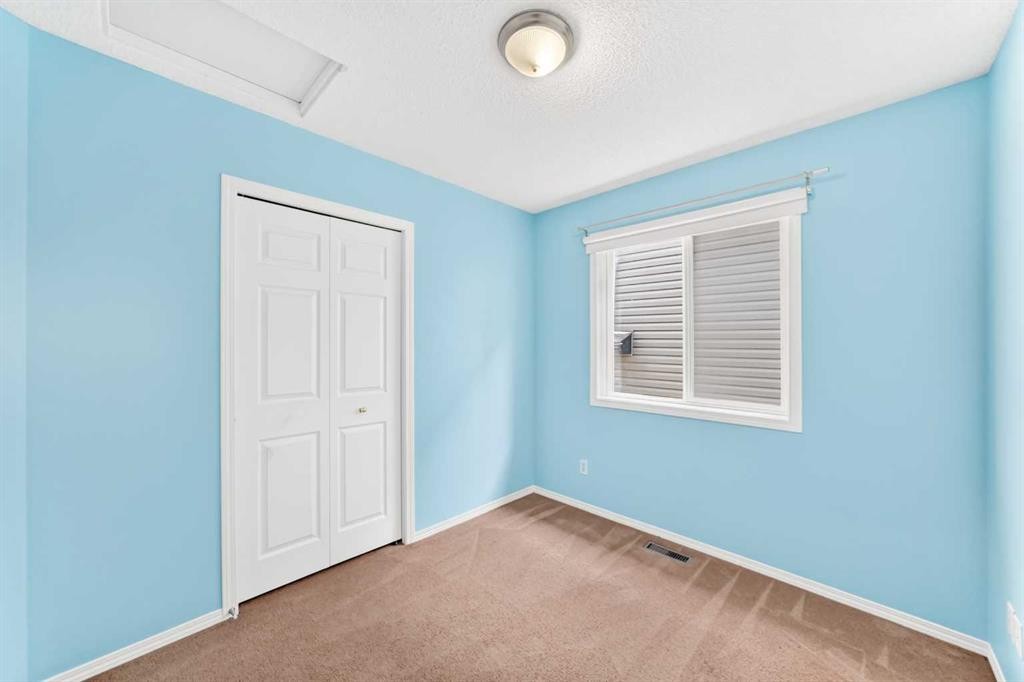76 Coville Close Ne, Calgary, AB - Indoor Photo Showing Other Room