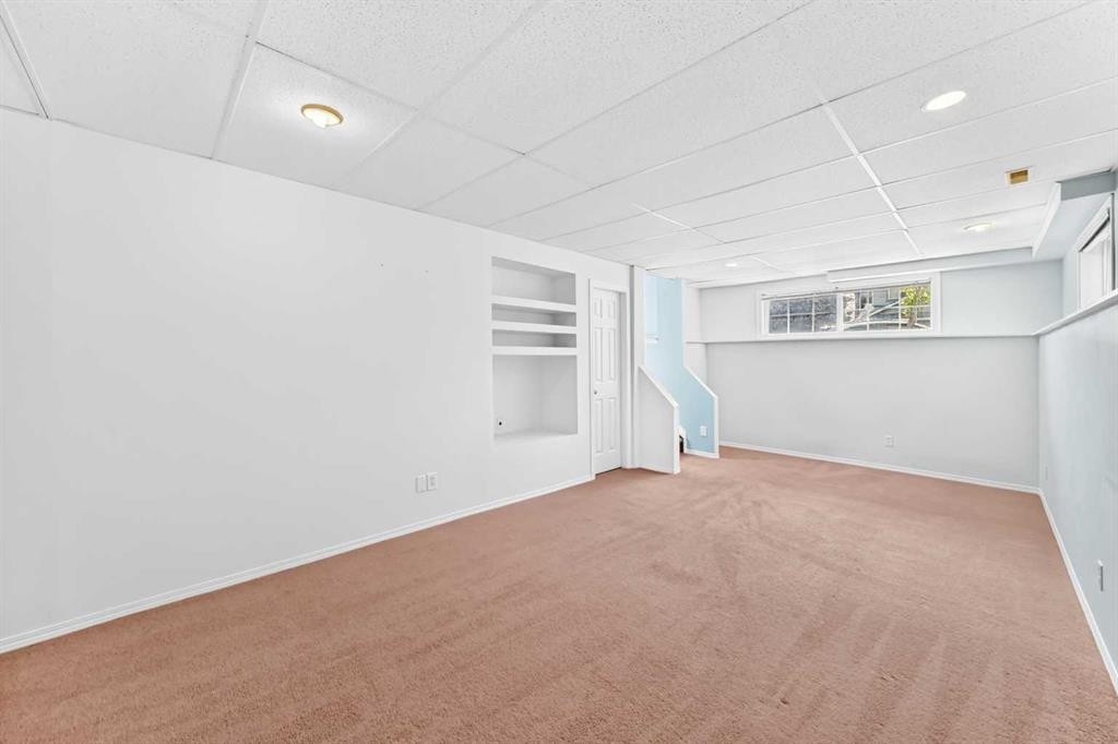76 Coville Close Ne, Calgary, AB - Indoor Photo Showing Other Room