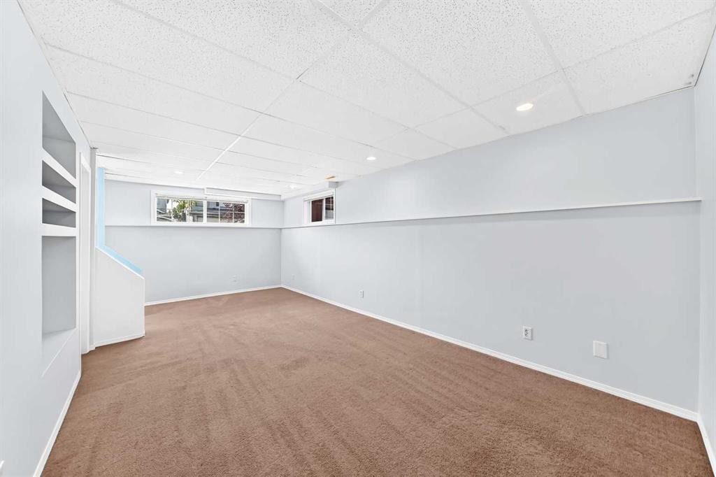 76 Coville Close Ne, Calgary, AB - Indoor Photo Showing Other Room