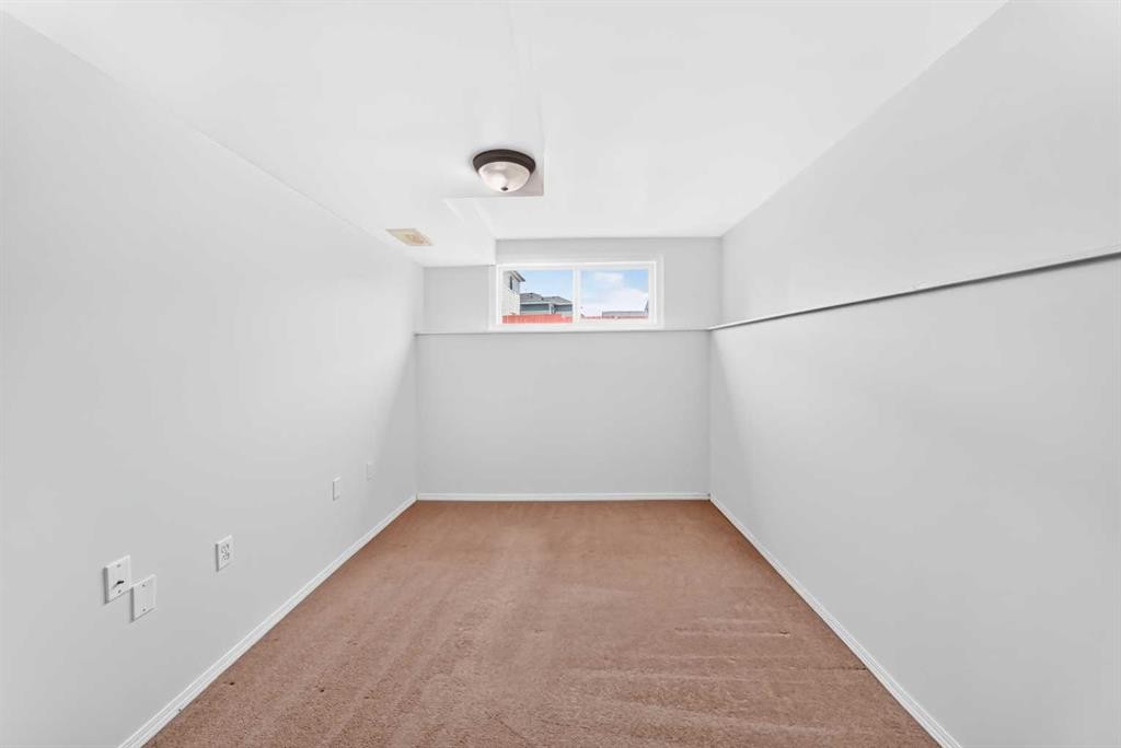 76 Coville Close Ne, Calgary, AB - Indoor Photo Showing Other Room