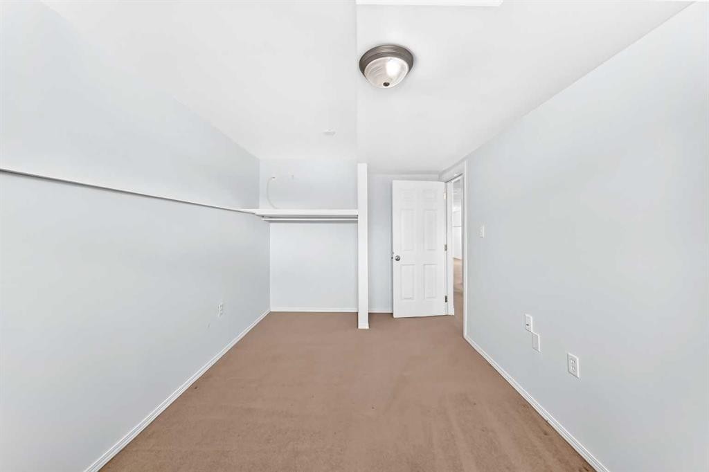 76 Coville Close Ne, Calgary, AB - Indoor Photo Showing Other Room