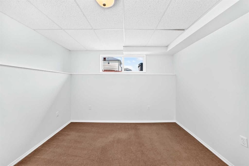 76 Coville Close Ne, Calgary, AB - Indoor Photo Showing Other Room
