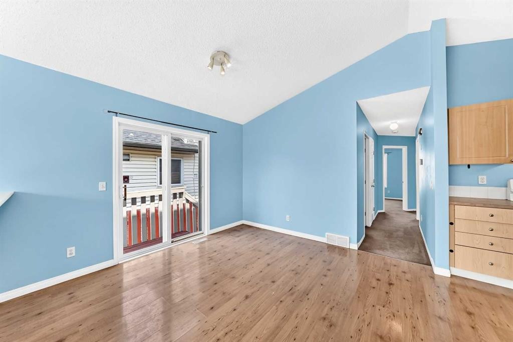 76 Coville Close Ne, Calgary, AB - Indoor Photo Showing Other Room