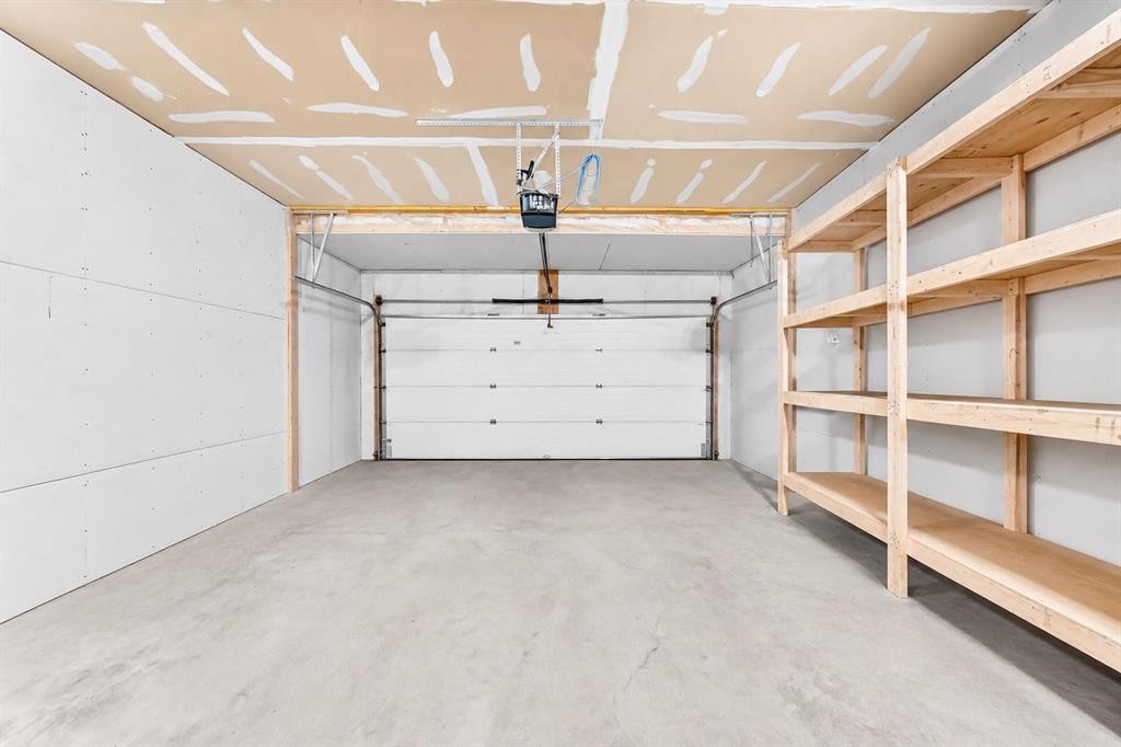 182 Cranfield Manor Se, Calgary, AB - Indoor Photo Showing Garage
