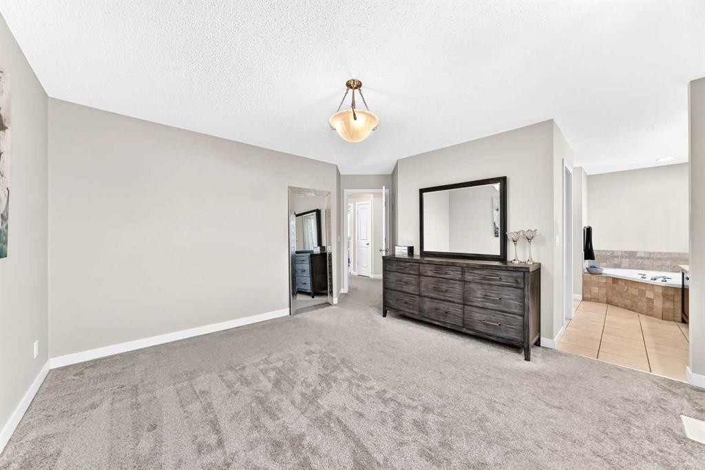 182 Cranfield Manor Se, Calgary, AB - Indoor Photo Showing Bedroom