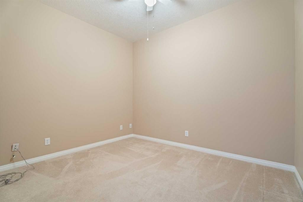 215-43 Sunrise Loop Se, High River, AB - Indoor Photo Showing Other Room