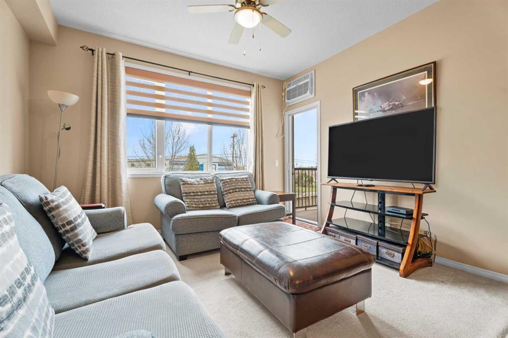 215-43 Sunrise Loop Se, High River, AB - Indoor Photo Showing Living Room