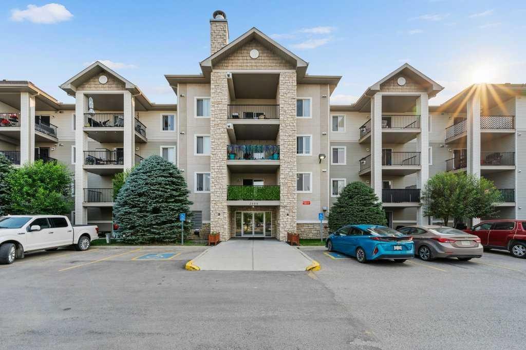 2207-12 Cimarron Common, Okotoks, AB - Outdoor With Balcony With Facade