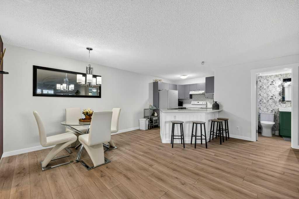 2207-12 Cimarron Common, Okotoks, AB - Indoor Photo Showing Dining Room