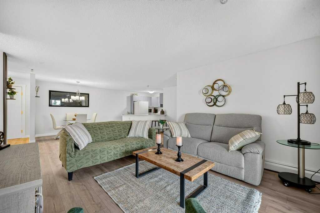 2207-12 Cimarron Common, Okotoks, AB - Indoor Photo Showing Living Room