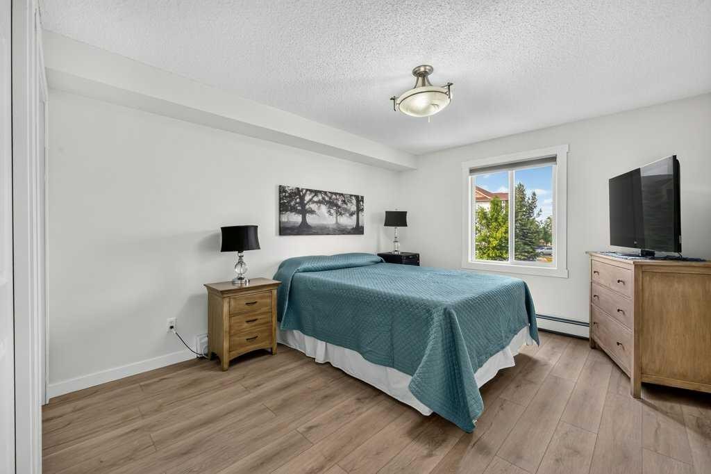 2207-12 Cimarron Common, Okotoks, AB - Indoor Photo Showing Bedroom