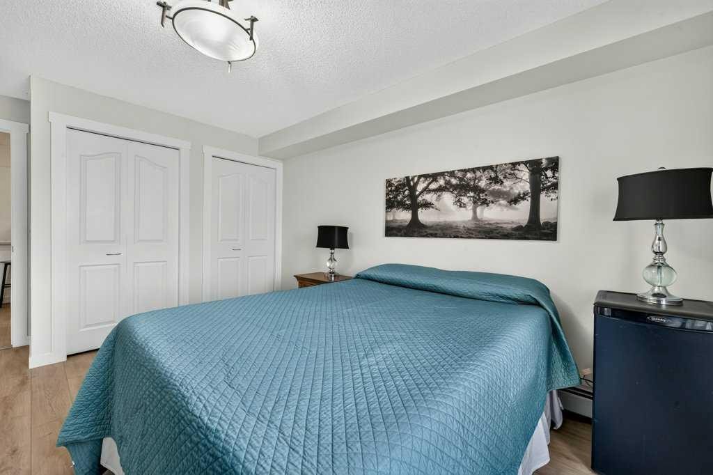2207-12 Cimarron Common, Okotoks, AB - Indoor Photo Showing Bedroom