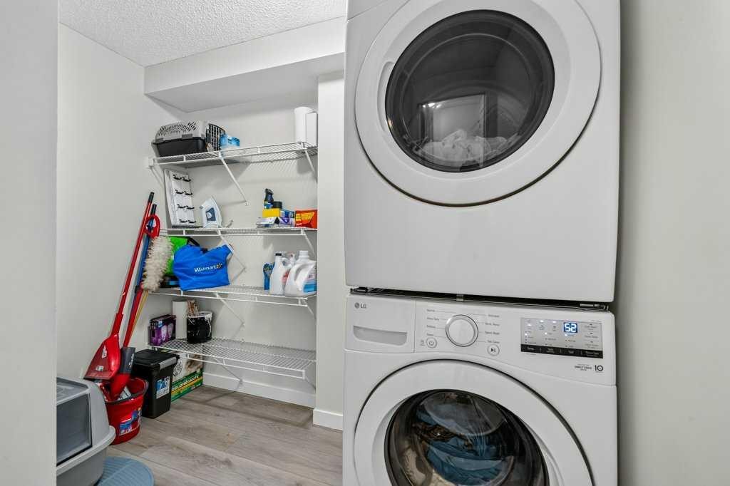 2207-12 Cimarron Common, Okotoks, AB - Indoor Photo Showing Laundry Room