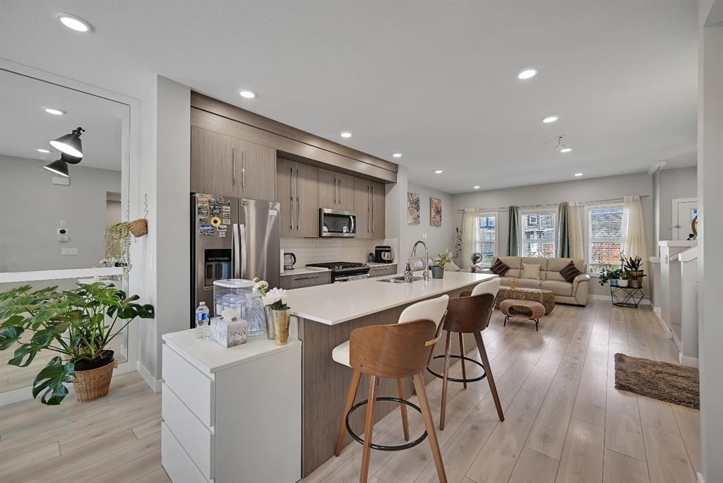 1265 Carrington Boulevard Nw, Calgary, AB - Indoor Photo Showing Kitchen With Upgraded Kitchen