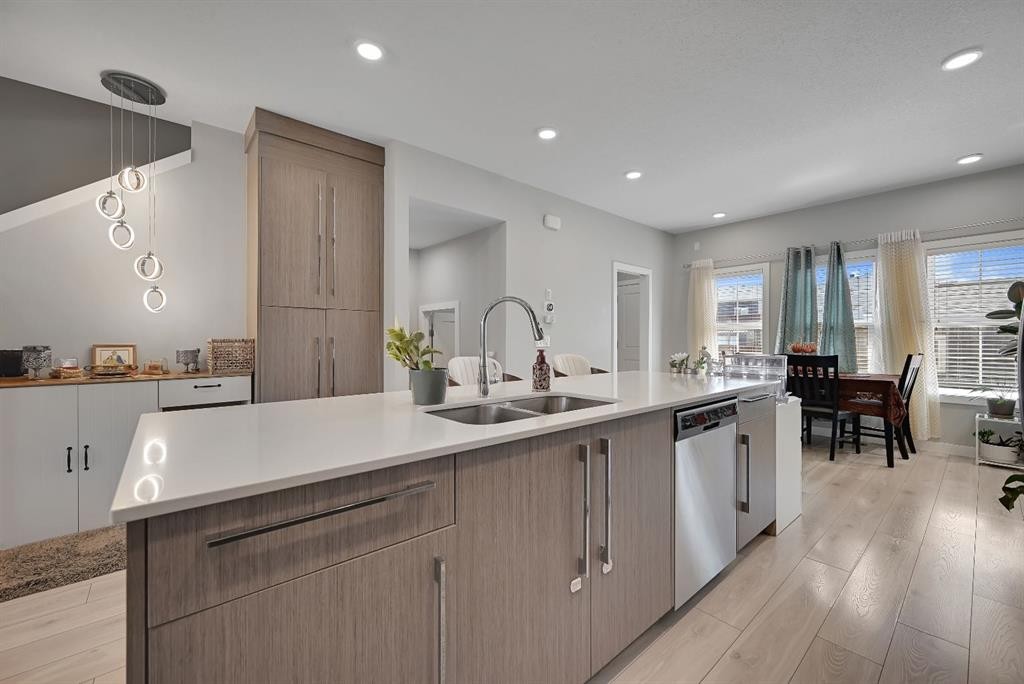1265 Carrington Boulevard Nw, Calgary, AB - Indoor Photo Showing Kitchen With Double Sink With Upgraded Kitchen