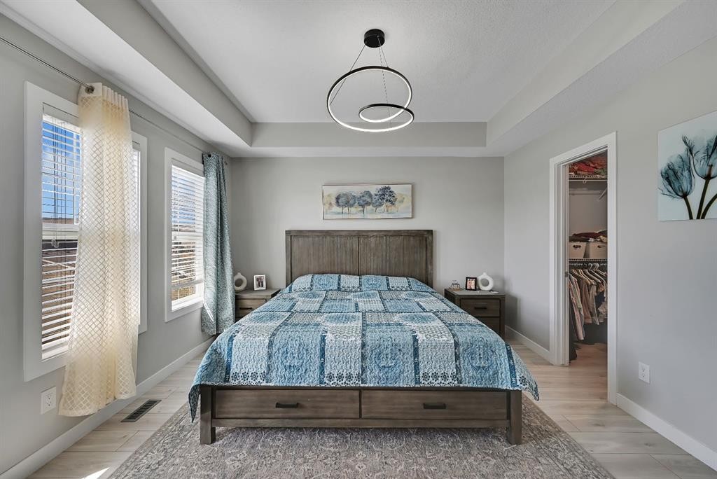 1265 Carrington Boulevard Nw, Calgary, AB - Indoor Photo Showing Bedroom