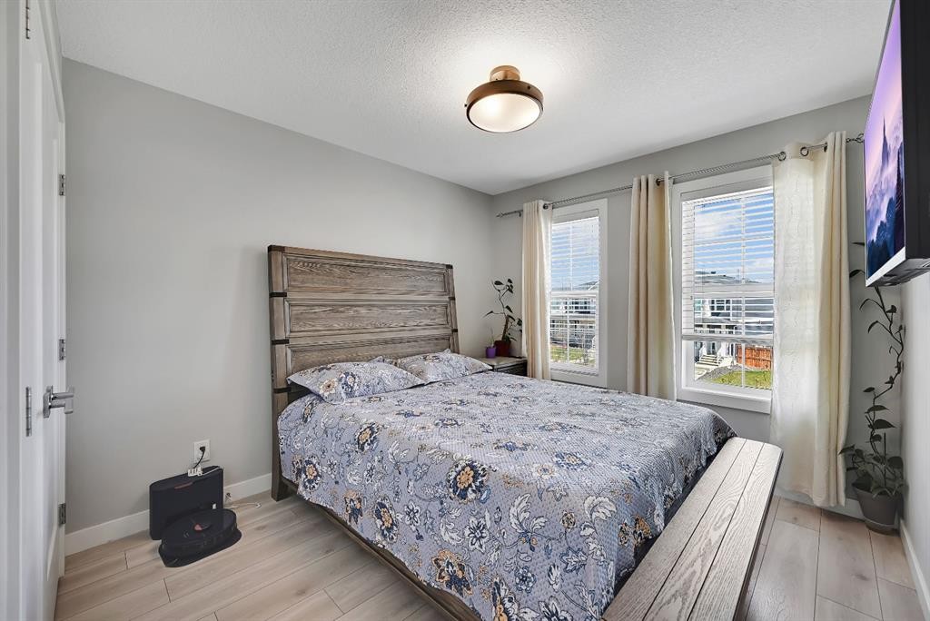 1265 Carrington Boulevard Nw, Calgary, AB - Indoor Photo Showing Bedroom