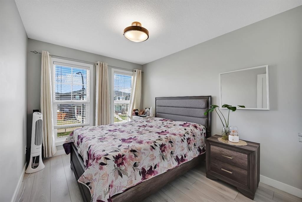 1265 Carrington Boulevard Nw, Calgary, AB - Indoor Photo Showing Bedroom