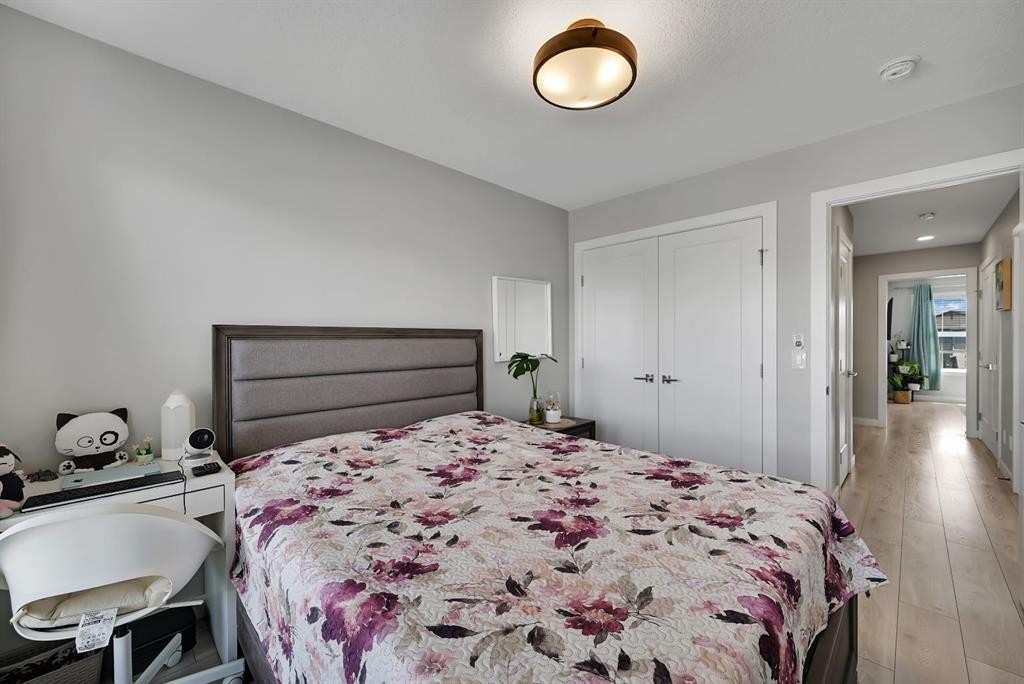 1265 Carrington Boulevard Nw, Calgary, AB - Indoor Photo Showing Bedroom