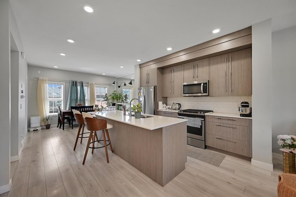1265 Carrington Boulevard Nw, Calgary, AB - Indoor Photo Showing Kitchen With Upgraded Kitchen