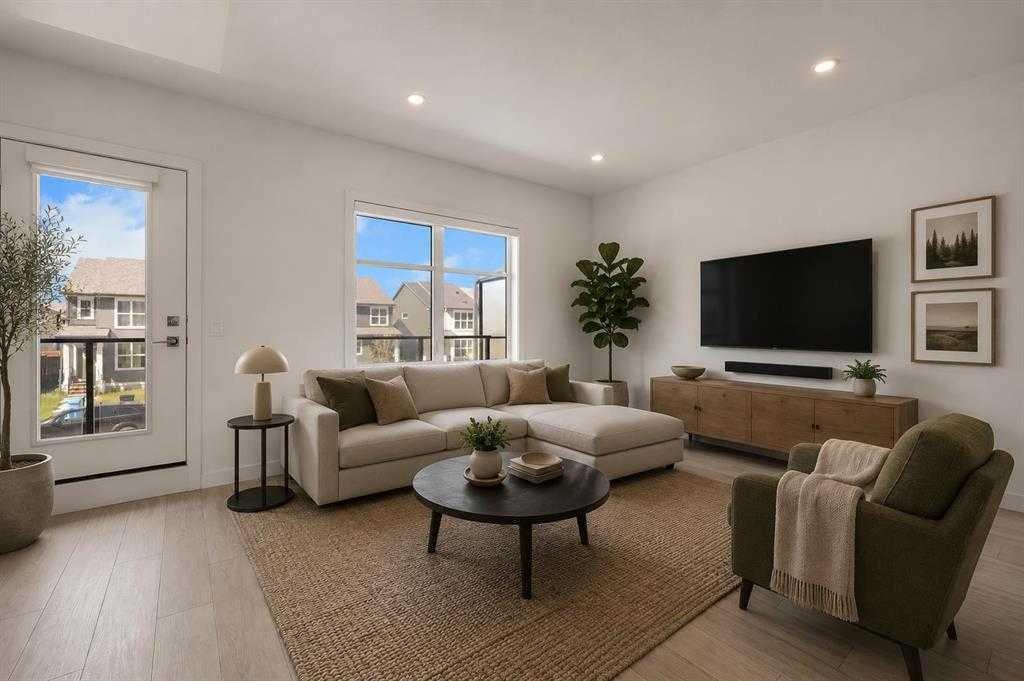 693 Savanna Boulevard Ne, Calgary, AB - Indoor Photo Showing Living Room