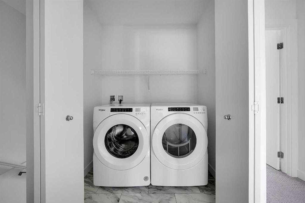 693 Savanna Boulevard Ne, Calgary, AB - Indoor Photo Showing Laundry Room